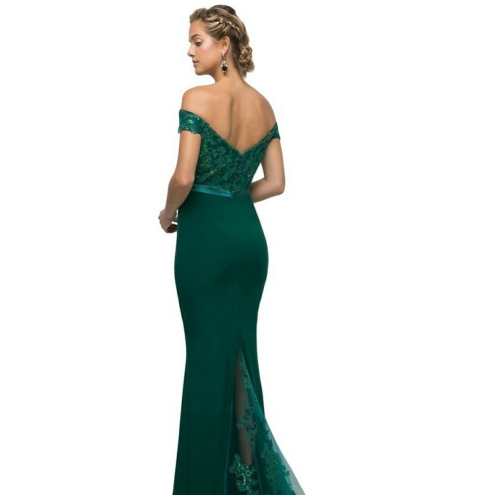 A long Mermaid dress with unique low detailed back